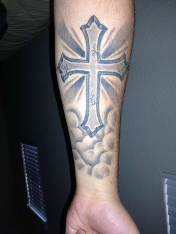 Cross with clouds tattoo