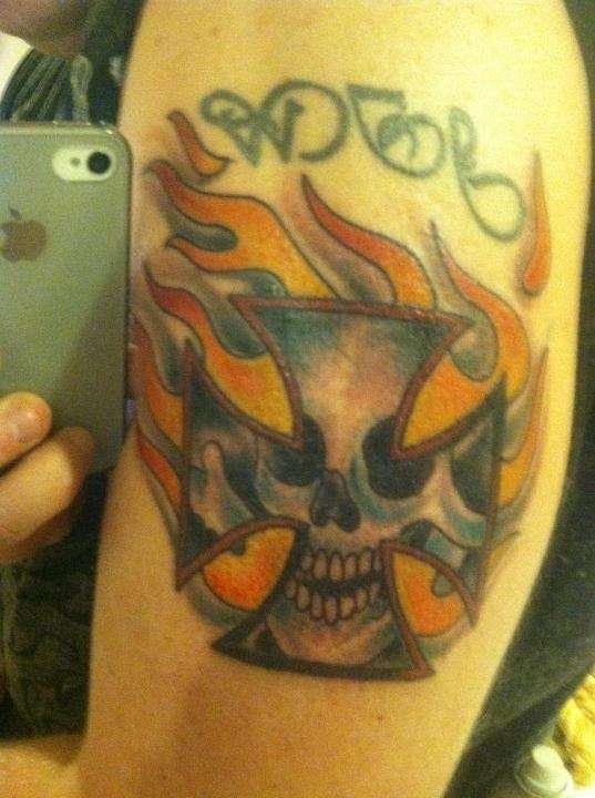 Flamed iron cross tattoo