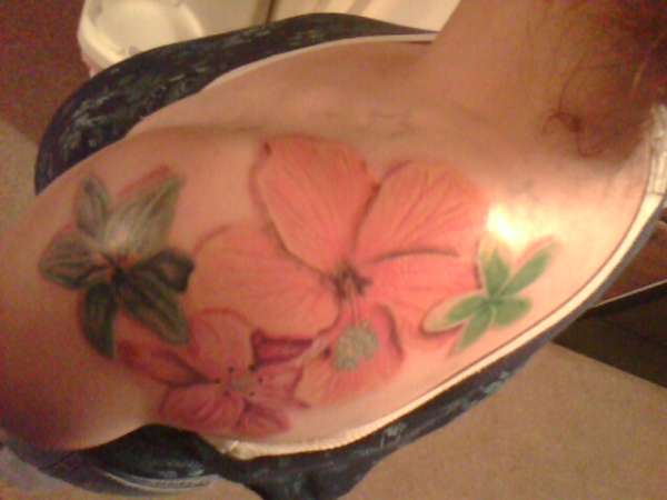 Flowers on shoulder tattoo