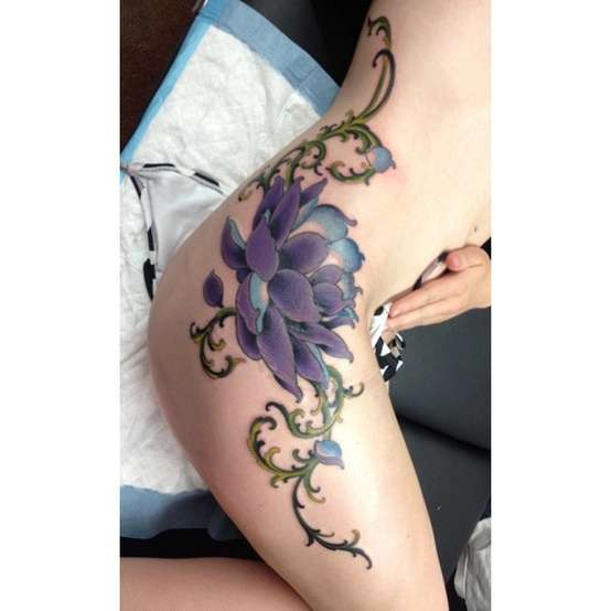Lotus Side Piece tattoo