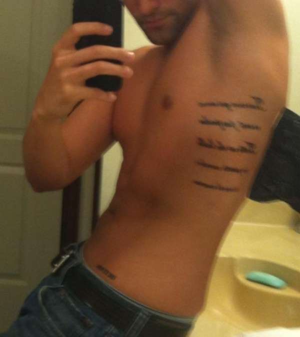 Rib piece tattoo