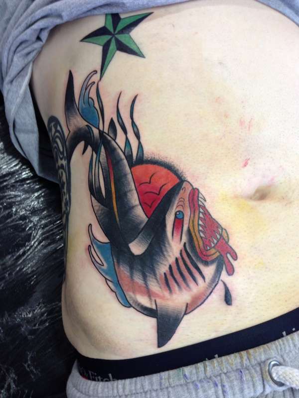 Shark on stomach tattoo