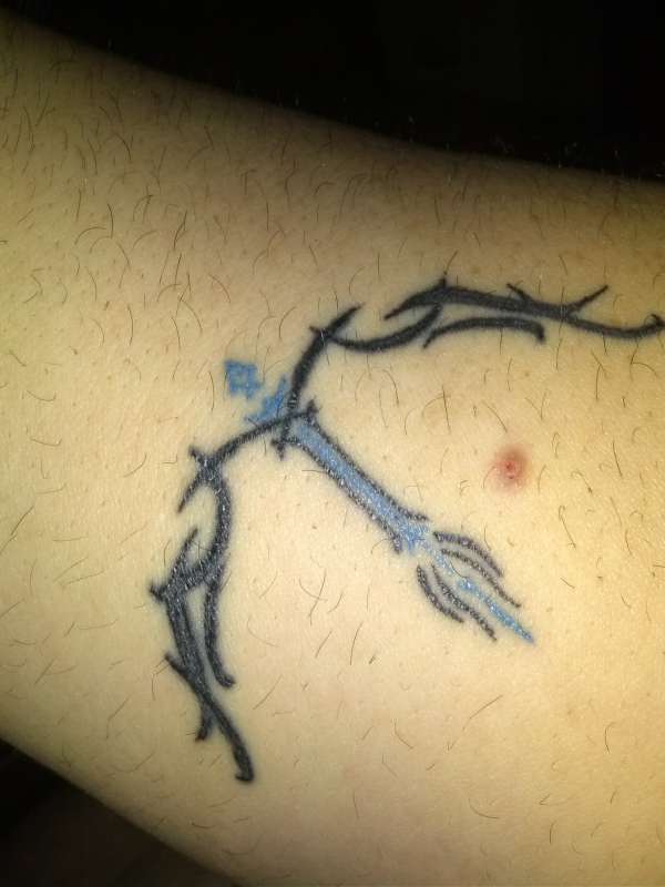 tribal sagittarius inside lower arm tattoo