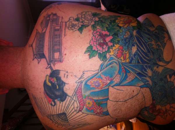 Half complete back tattoo