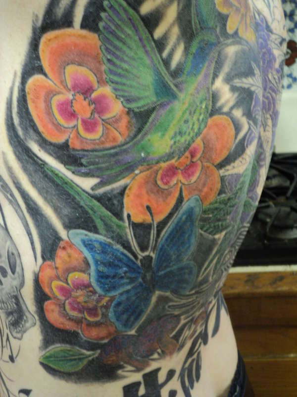 Hummingbird/Flowers tattoo