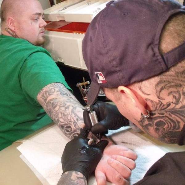 Mike Benneig Tattooing on Jason Griffith tattoo