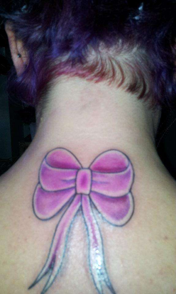 bow on back of neck tattoo