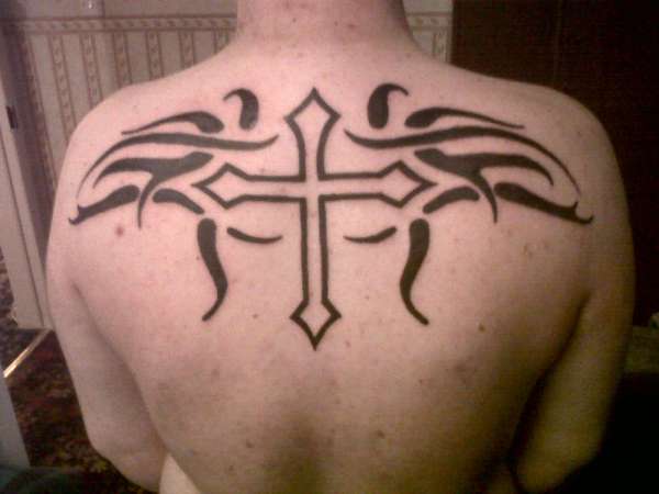 cross and tribal tattoo