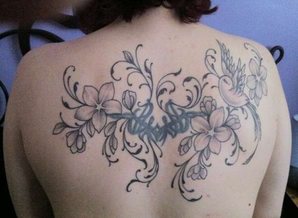 flowers and birdy tattoo