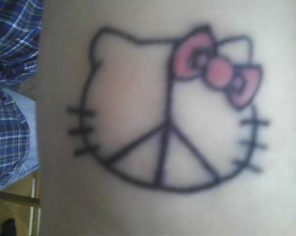 hello kitty peace sign tattoo