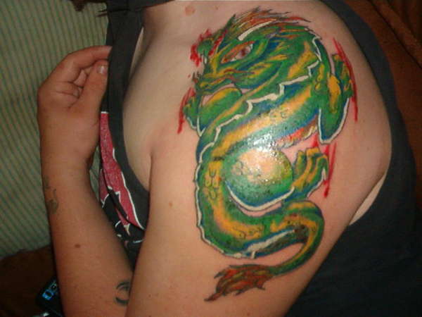 dragon/ left sholder tattoo