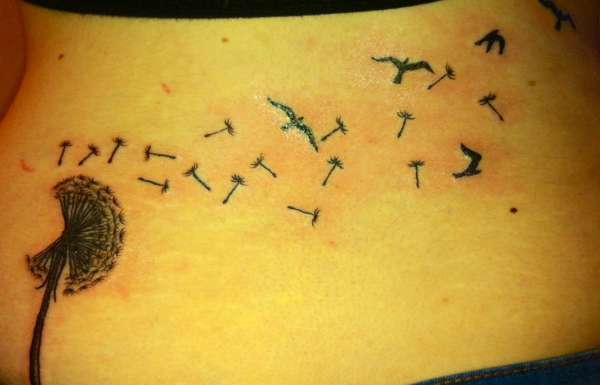 Dandelion lower back tattoo