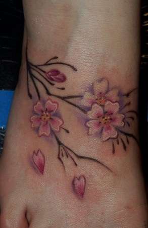 Flowers on foot tattoo
