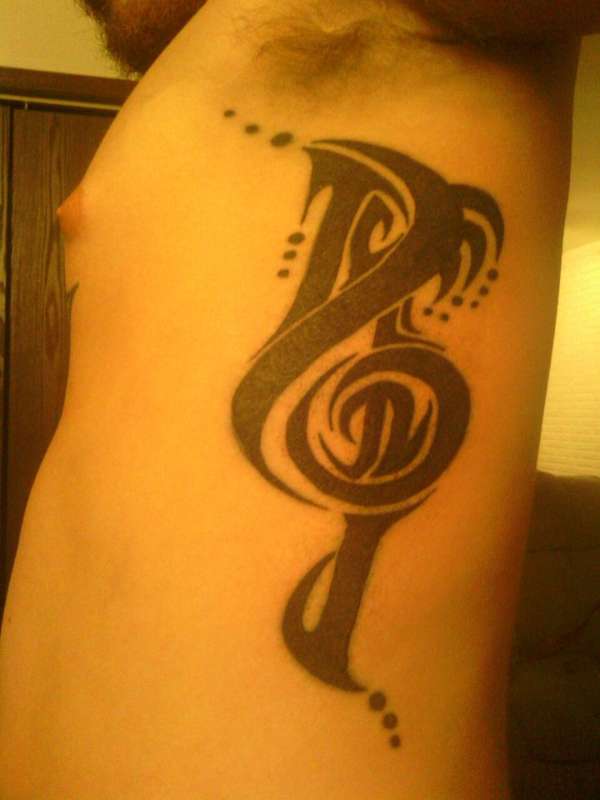 Tribal Music Note tattoo