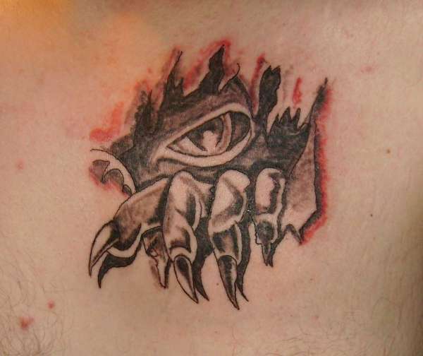beast clawng through chest tattoo