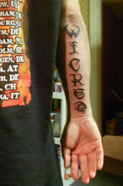 wicked word tattoo