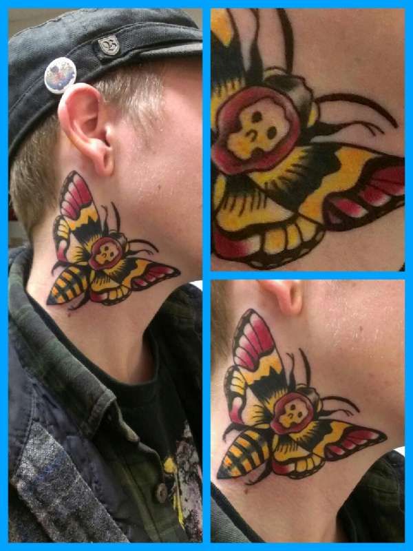 Death moth tattoo
