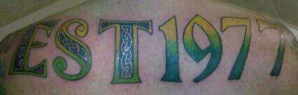 Est 1977 tattoo