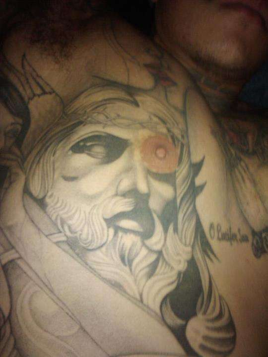 Jesus piece tattoo