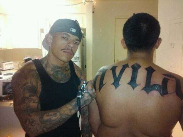 Last name on brother n law tattoo