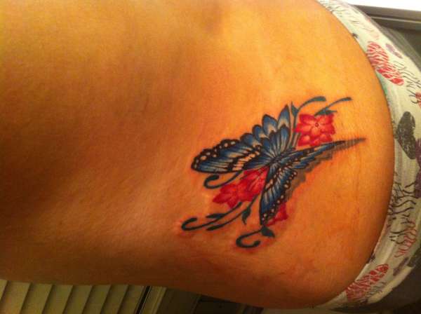 Lower back butterfly tattoo