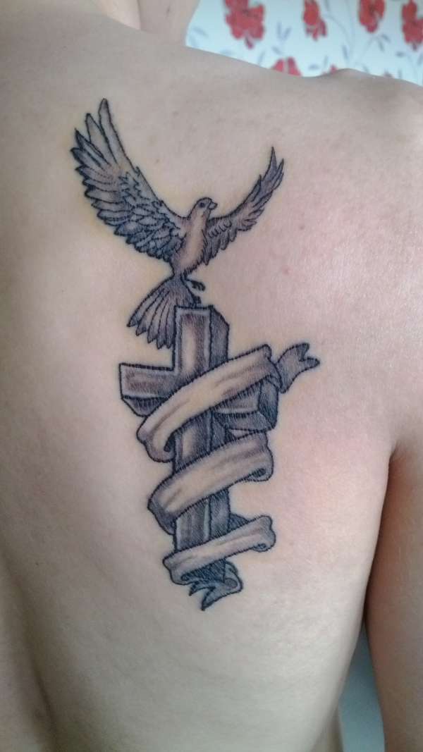 bird and cross tattoo