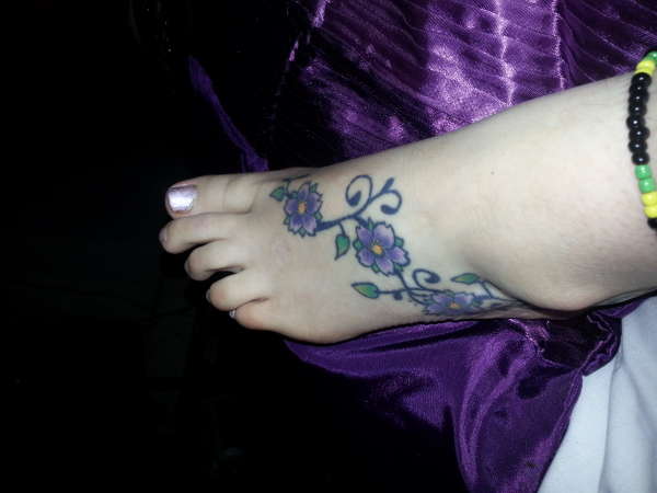 foot flowers tattoo