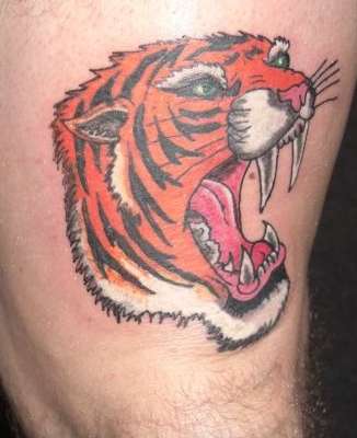 growling tigers head tattoo