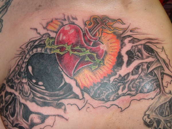 sacred heart cover-up tattoo