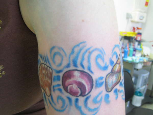 seashell armband tattoo