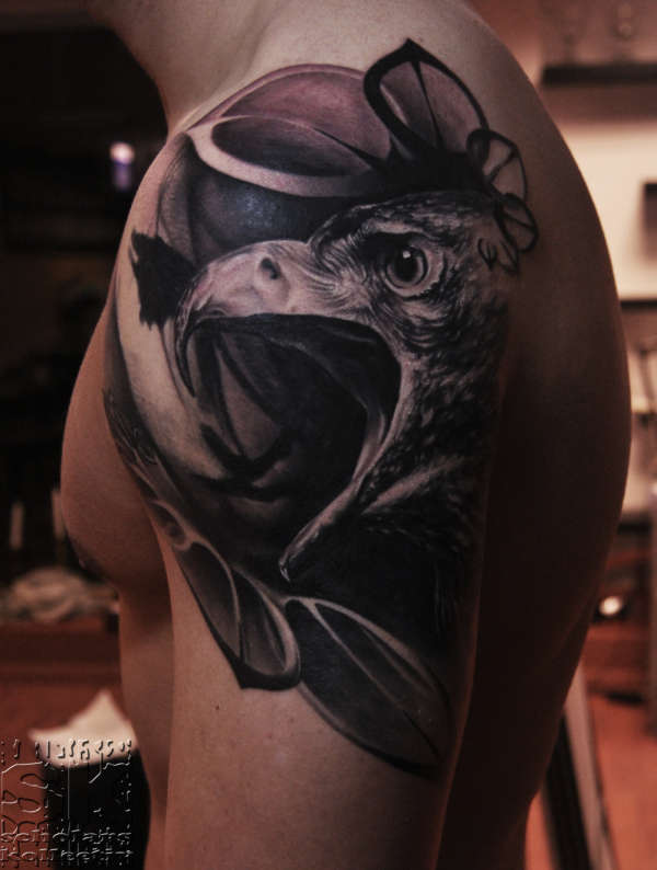 Eagle on upper arm tattoo