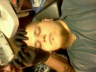 Me getting my horns tattoo