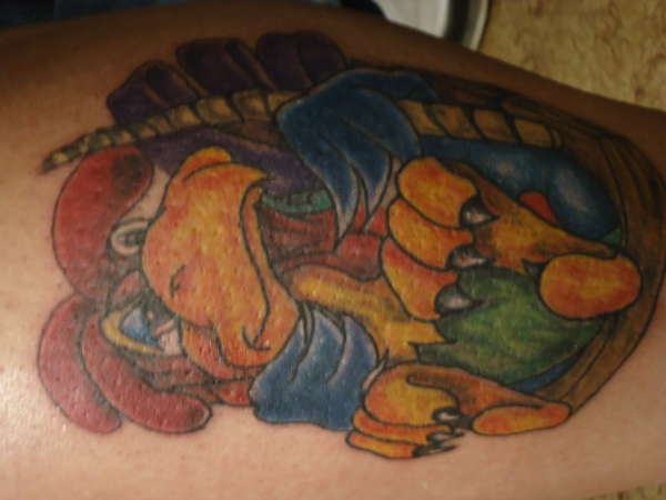 cock swingin below his knees tattoo