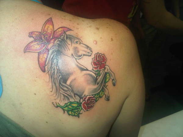 horse , roses and tiger Lilly tattoo