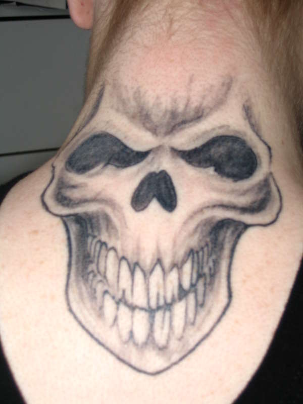 scary skull ,considering i'm a girl! tattoo