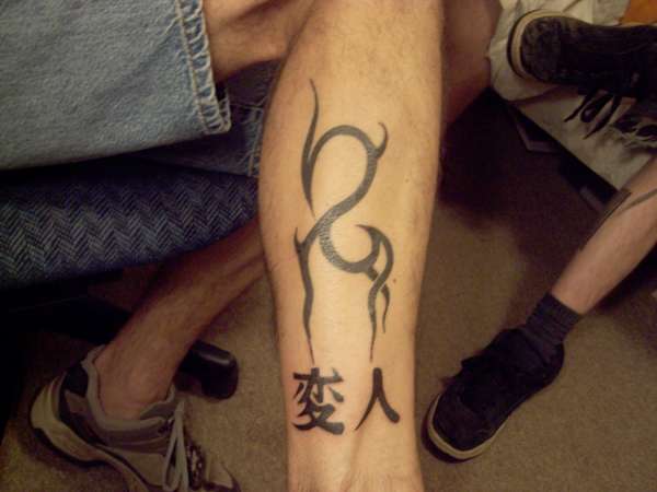 tribal on calf tattoo