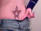 tribal star tattoo