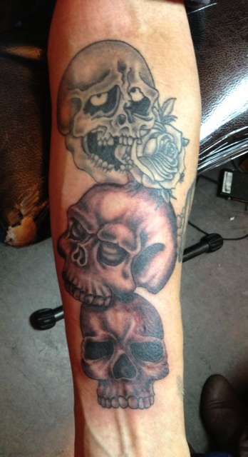 skull totem pole tattoo