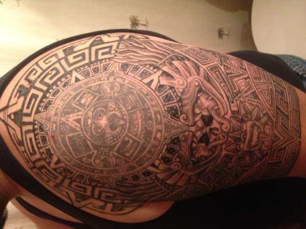 Aztec half sleeve tattoo.