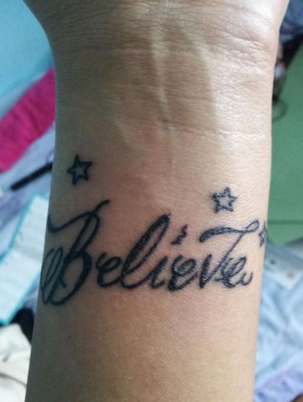 Believe on wrist tattoo