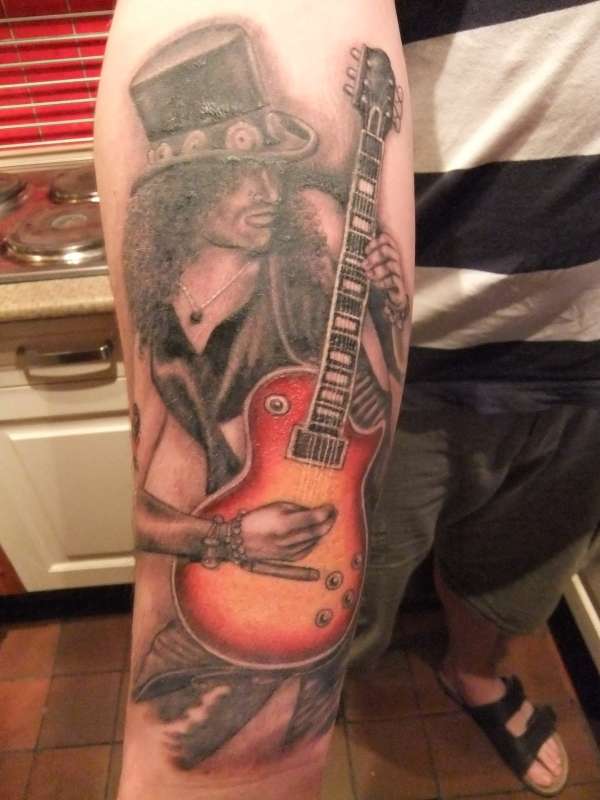 Slash, from Guns N Roses. tattoo