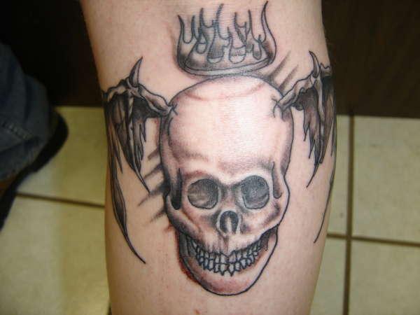 skull with wings tattoo