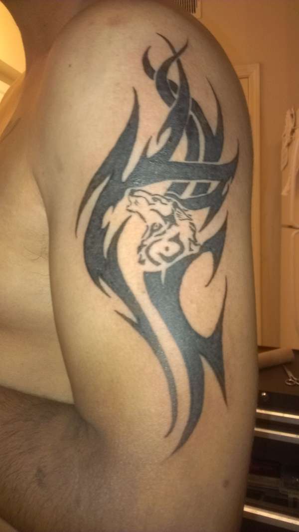 tribal wolf tattoo