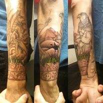 Egyptian forearm sleeve tattoo