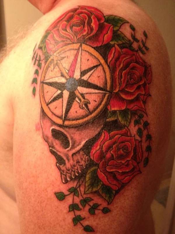 Roses and compass tattoo