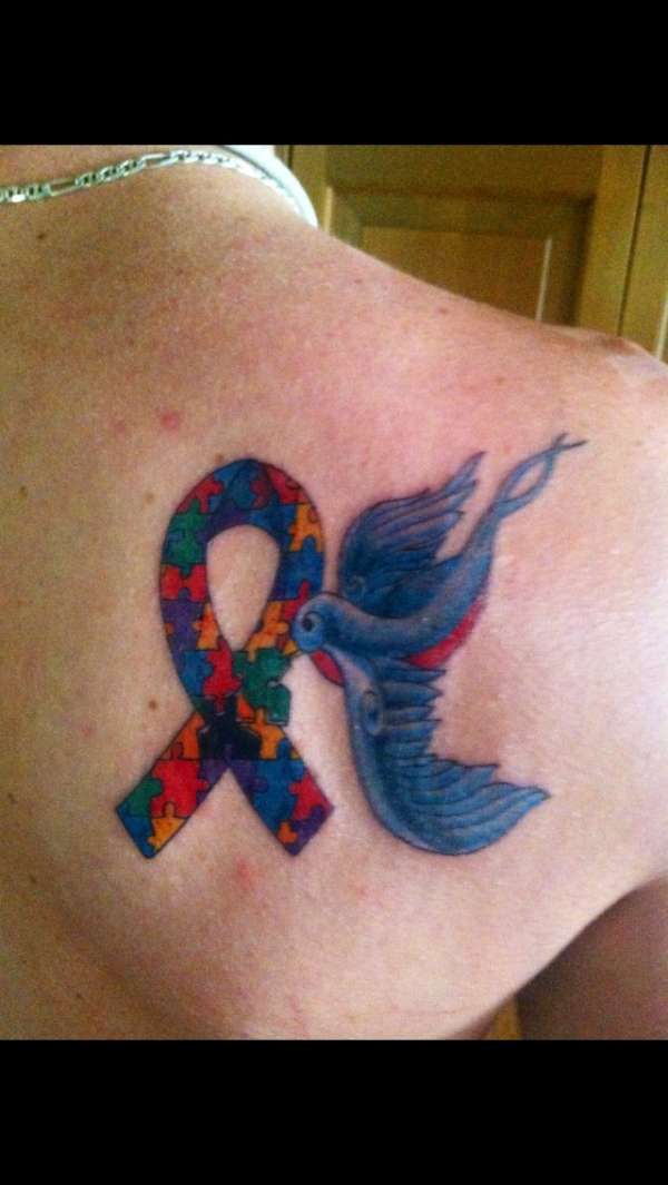 Autism awareness tribute tattoo