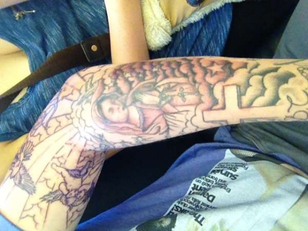 My boyfriends religious arm! tattoo