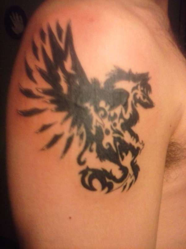 Winged Wolf tattoo