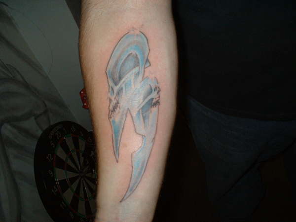 skull blades tattoo