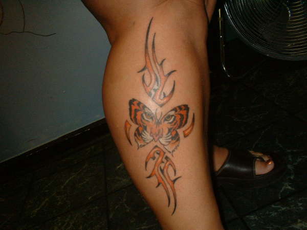 tribal tiger butterfly tattoo